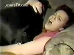 Lonely old floozy getting twat screwed by her dog on Christmas eve in this animal sex video 